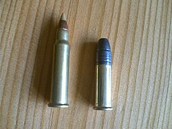 A .17 HMR round with a ballistic tip (left) compared with a .22 Long Rifle round (right)